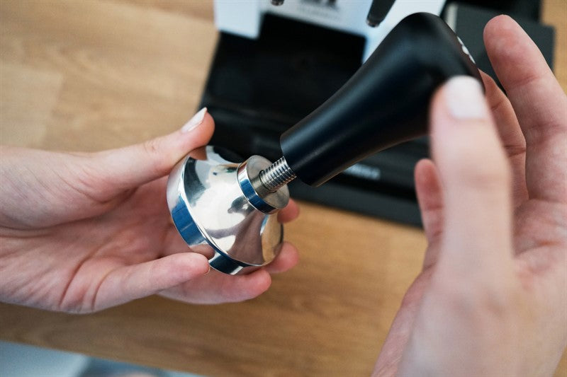 ADJUSTABLE TAMPER